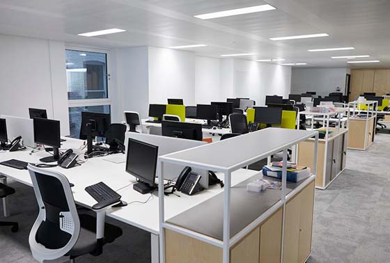 empty-open-plan-office-with-multiple-work-stations